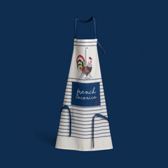 Eco-friendly French kitchen apron featuring a stylized rooster and Eiffel Tower illustration with the phrase 'French Cocorico' on a white background with blue stripes and matching blue ties.