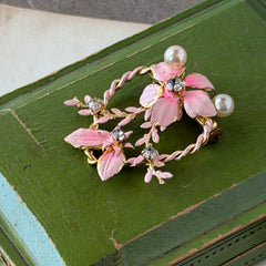 Vintage Austrian pink enamel floral heart brooch with faux pearls and rhinestones on gold‑plated heart frame.