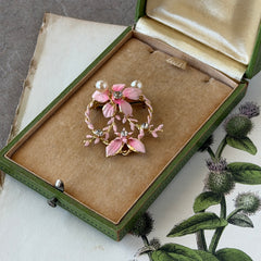 Vintage Austrian pink enamel floral heart brooch with faux pearls and rhinestones on gold‑plated heart frame.