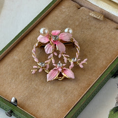 Vintage Austrian pink enamel floral heart brooch with faux pearls and rhinestones on gold‑plated heart frame.