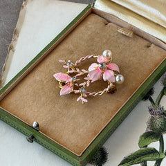 Vintage Austrian pink enamel floral heart brooch with faux pearls and rhinestones on gold‑plated heart frame.
