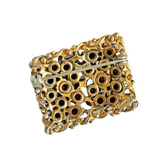 A vintage Barclay gold‑tone brooch set with jonquil rhinestones in mixed cuts, shown from various angles to display its shape, details, and condition.