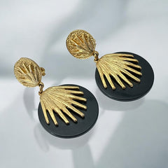 Vintage French Designer Black Disk and Gold Tone Palmetto Dangle Clip-On Earrings (1980s)