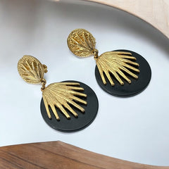 Vintage French Designer Black Disk and Gold Tone Palmetto Dangle Clip-On Earrings (1980s)