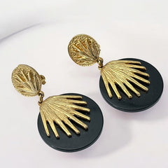 Vintage French Designer Black Disk and Gold Tone Palmetto Dangle Clip-On Earrings (1980s)