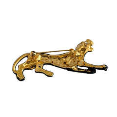 Black matte enamel panther brooch with clear rhinestones and gold tone accents, vintage 1990s animal jewelry.