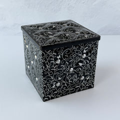 French black matelassé metal tea cube tin with silver accents and a pink teapot motif by Moldeo
