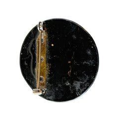 Vintage round brooch with real dried flowers encased in clear resin on a lacquered wood base, shown from multiple angles.