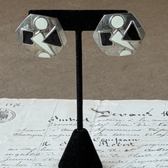 Vintage 1980s black and white enamel geometric hexagonal post earrings with silver tone and abstract motifs, with on original Impressions card.