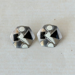 Vintage 1980s black and white enamel geometric hexagonal post earrings with silver tone and abstract motifs, with on original Impressions card.