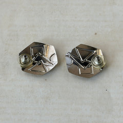 Vintage 1980s black and white enamel geometric hexagonal post earrings with silver tone and abstract motifs, with on original Impressions card.