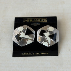 Vintage 1980s black and white enamel geometric hexagonal post earrings with silver tone and abstract motifs, with on original Impressions card.