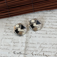 Vintage 1980s black and white enamel geometric hexagonal post earrings with silver tone and abstract motifs, with on original Impressions card.