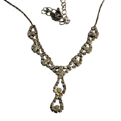 Vintage silver‑tone necklace with a delicate blue and clear rhinestone drop pendant on an adjustable chain.