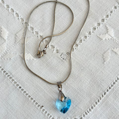 Vintage light blue faceted crystal heart pendant on a silver tone chain, 1990s French necklace.