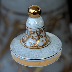 Vintage Bohemia Slavia Glassworks marbled glass lidded candy dish with raised gold scrollwork, gold trim, and spherical knob, shown from multiple angles to highlight decorative details and condition.
