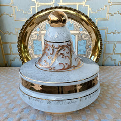 Vintage Bohemia Slavia Glassworks marbled glass lidded candy dish with raised gold scrollwork, gold trim, and spherical knob, shown from multiple angles to highlight decorative details and condition.