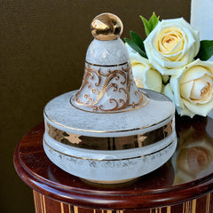 Vintage Bohemia Slavia Glassworks marbled glass lidded candy dish with raised gold scrollwork, gold trim, and spherical knob, shown from multiple angles to highlight decorative details and condition.