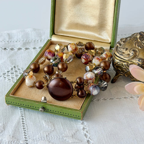 Vintage 3‑strand bracelet with Aurum and Vitrail crystal beads, faux jasper art glass beads, and shiny brown beads in gold tone