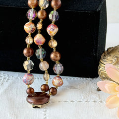 Vintage 3‑strand bracelet with Aurum and Vitrail crystal beads, faux jasper art glass beads, and shiny brown beads in gold tone