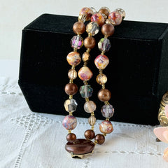 Vintage 3‑strand bracelet with Aurum and Vitrail crystal beads, faux jasper art glass beads, and shiny brown beads in gold tone
