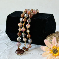 Vintage 3‑strand bracelet with Aurum and Vitrail crystal beads, faux jasper art glass beads, and shiny brown beads in gold tone