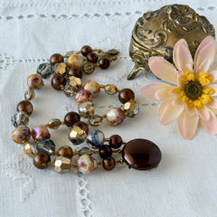 Vintage 3‑strand bracelet with Aurum and Vitrail crystal beads, faux jasper art glass beads, and shiny brown beads in gold tone