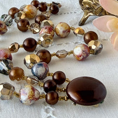 Vintage 3‑strand bracelet with Aurum and Vitrail crystal beads, faux jasper art glass beads, and shiny brown beads in gold tone