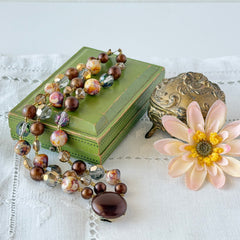 Vintage 3‑strand bracelet with Aurum and Vitrail crystal beads, faux jasper art glass beads, and shiny brown beads in gold tone