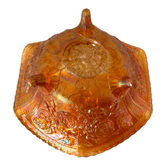 Vintage Imperial Glass marigold carnival bowl with Lustre Rose pattern, iridescent finish, scalloped edge, and three-footed base.