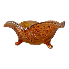 Vintage Imperial Glass marigold carnival bowl with Lustre Rose pattern, iridescent finish, scalloped edge, and three-footed base.