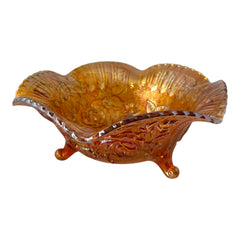 Vintage Imperial Glass marigold carnival bowl with Lustre Rose pattern, iridescent finish, scalloped edge, and three-footed base.