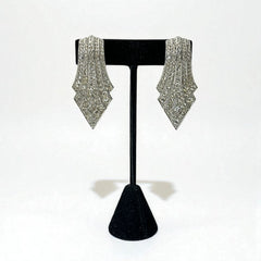 Vintage Carolee clip-on earrings with silver-tone Art Deco design and clear pave rhinestones; signed and in very good condition, circa 1980s.