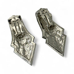 Vintage Carolee clip-on earrings with silver-tone Art Deco design and clear pave rhinestones; signed and in very good condition, circa 1980s.