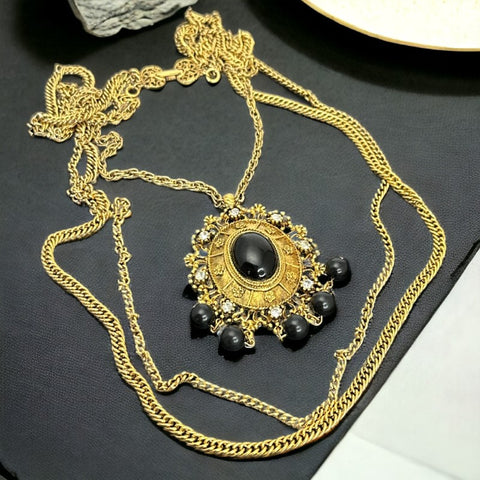 Vintage Celebrity Black Cabochon Ornate Oval Pendant Triple Gold Tone Chain Long Necklace | Late 1960s Black &amp; Gold Tone Statement Jewelry