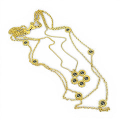 Vintage Celebrity gold‑tone necklace with gray glass chicklet elements, featuring a five‑round floral pendant and multiple convertible strands.