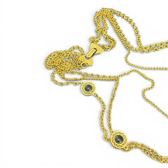 Vintage Celebrity gold‑tone necklace with gray glass chicklet elements, featuring a five‑round floral pendant and multiple convertible strands.