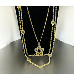 Vintage Celebrity gold‑tone necklace with gray glass chicklet elements, featuring a five‑round floral pendant and multiple convertible strands.