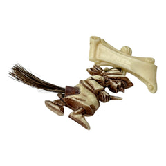 Vintage French brooch depicting a witch flying on a broom, crafted from celluloid with horsehair bristles; she wears a headscarf and holds a wand, mid-century design from the 1950s–60s, approx. 1¾" x 1½", in very good condition with secure pin back and folk-inspired detailing.