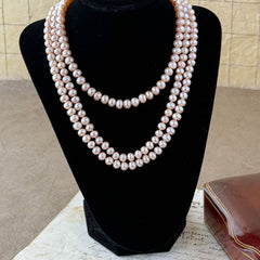 Vintage Chinese light pink freshwater pearl necklace with silver‑tone clasp engraved with Chinese characters.