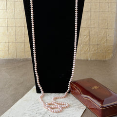Vintage Chinese light pink freshwater pearl necklace with silver‑tone clasp engraved with Chinese characters.