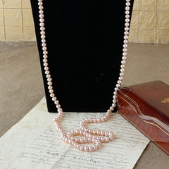 Vintage Chinese light pink freshwater pearl necklace with silver‑tone clasp engraved with Chinese characters.