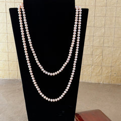 Vintage Chinese light pink freshwater pearl necklace with silver‑tone clasp engraved with Chinese characters.