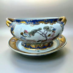 Vintage Chinese porcelain tureen and platter set with hand-painted European hunting scenes, cobalt blue and gold detailing, signed in red glaze with Chinese characters and marked with mid-century Macau export label.