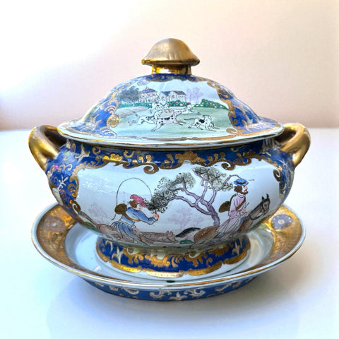 Vintage Chinese porcelain tureen and platter set with hand-painted European hunting scenes, cobalt blue and gold detailing, signed in red glaze with Chinese characters and marked with mid-century Macau export label.
