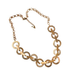 Vintage gold tone necklace with interlocking clear rhinestone circle links and lobster clasp.