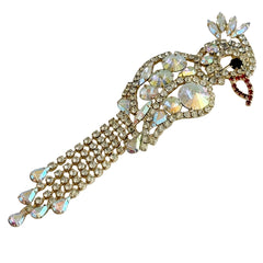 Vintage gold‑tone cockatoo brooch with AB rhinestones and tassel tail, oversized statement bird pin.