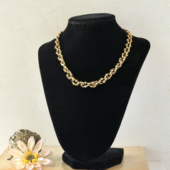 Vintage Cookie Lee gold‑tone cable chain necklace with textured links and toggle clasp, shown in close‑up to display design and condition.