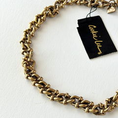 Vintage Cookie Lee gold‑tone cable chain necklace with textured links and toggle clasp, shown in close‑up to display design and condition.