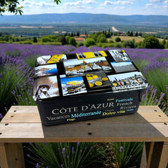 French holiday tin gift box with two mini Marseille soaps and a lavender sachet nestled in crinkle paper, available in Paris, Nice, or Côte d’Azur designs — a festive surprise gift from France.